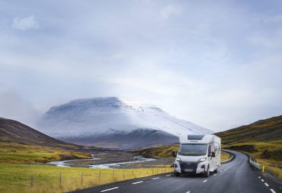 Curve line road with snow mountain background Autumn season Iceland